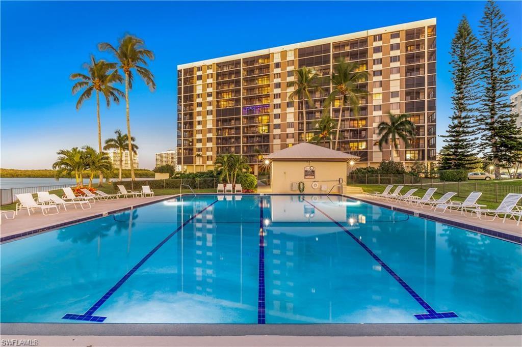 15 Bluebill Avenue, Unit 702 Naples, FL 34108 - Photo 22 of 23 Pool Shared by SC II & III