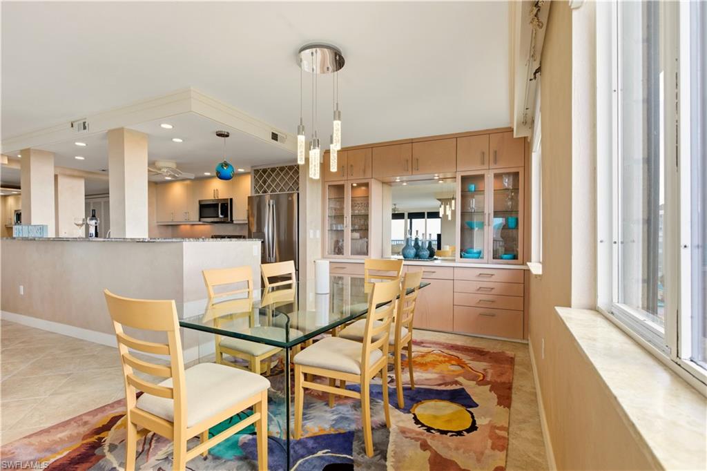 15 Bluebill Avenue, Unit 702 Naples, FL 34108 - Photo 6 of 23 Dining Area