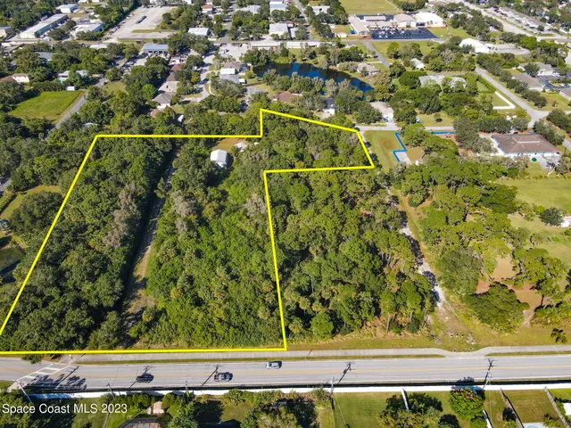 an aerial view of a residential houses