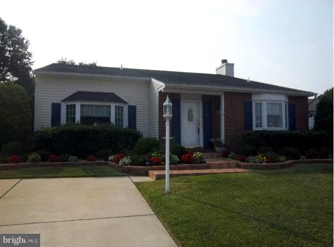 4825 Vicky Road Nottingham, MD 21236 - Photo 1 of 24 a view of house and yard with green space