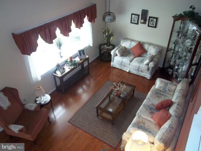4825 Vicky Road Nottingham, MD 21236 - Photo 3 of 24 a living room with furniture and a couch