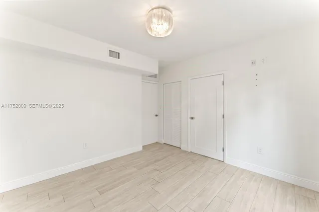 a open kitchen with stainless steel appliances granite countertop a refrigerator sink and cabinets