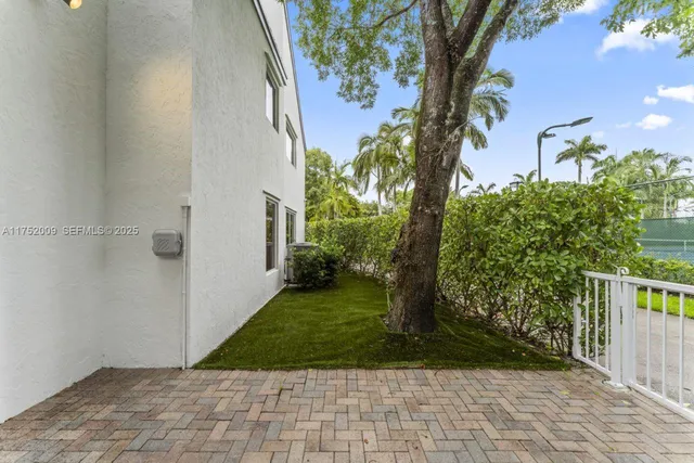 a view of an empty room and wooden floor