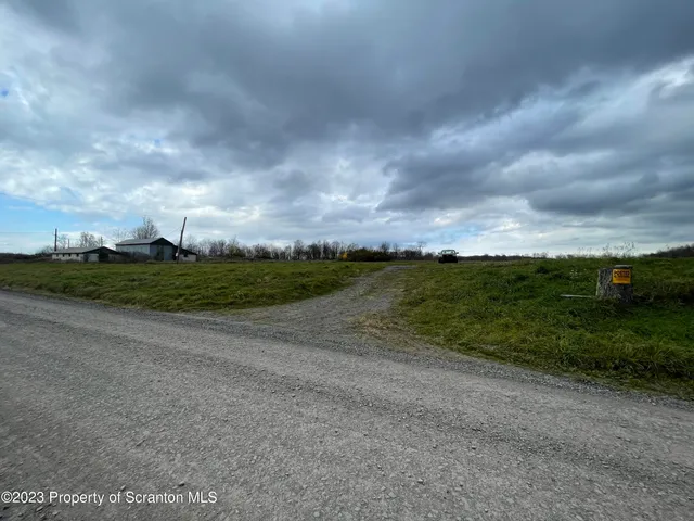 a view of a city street from a building