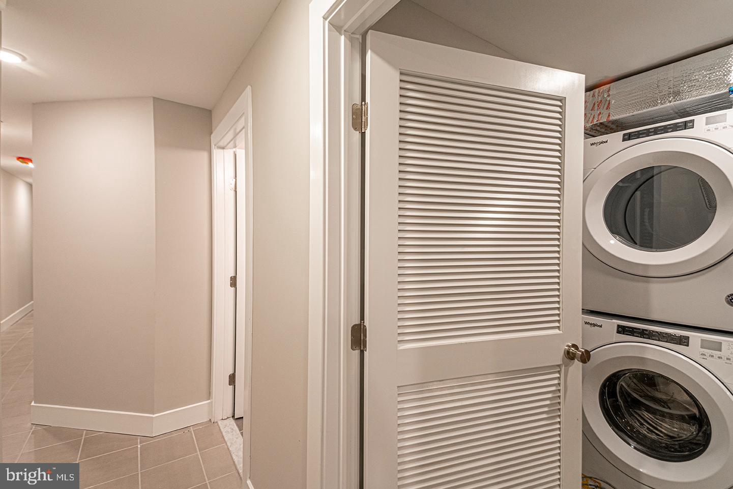 715 South 51st Street, Unit 1 Philadelphia, PA 19143 - Photo 11 of 18 a view of a hallway with washer and dryer