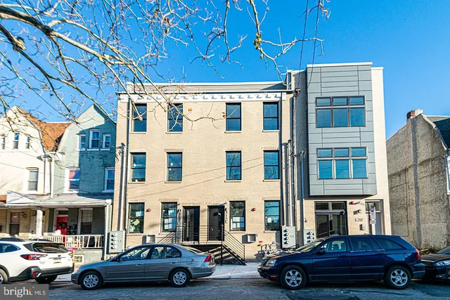 a car parked in front of a building