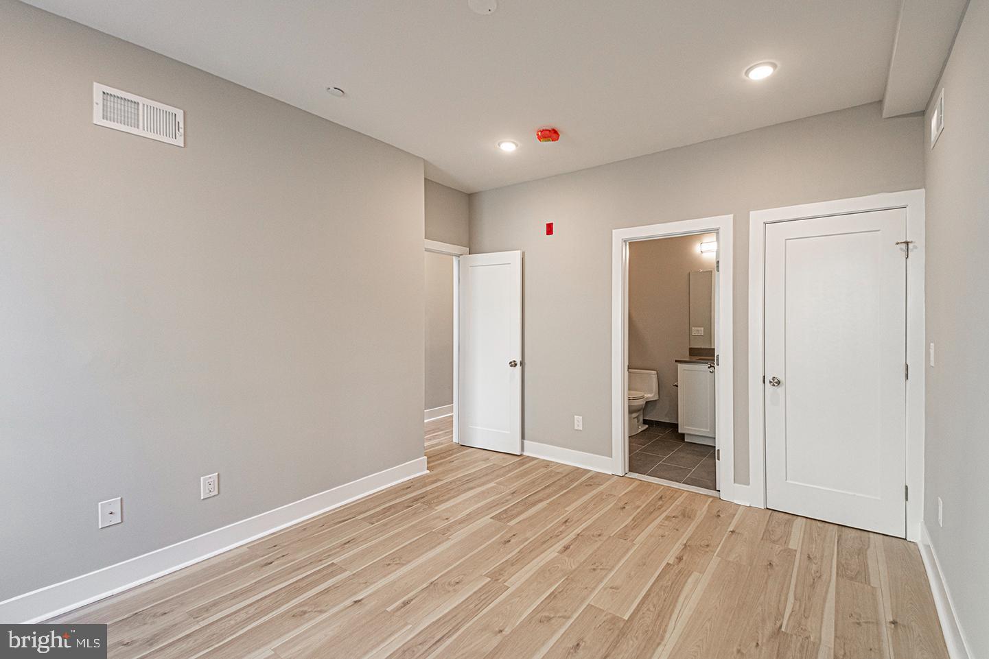 715 South 51st Street, Unit 1 Philadelphia, PA 19143 - Photo 4 of 18 a view of a room with a closet and a bathroom