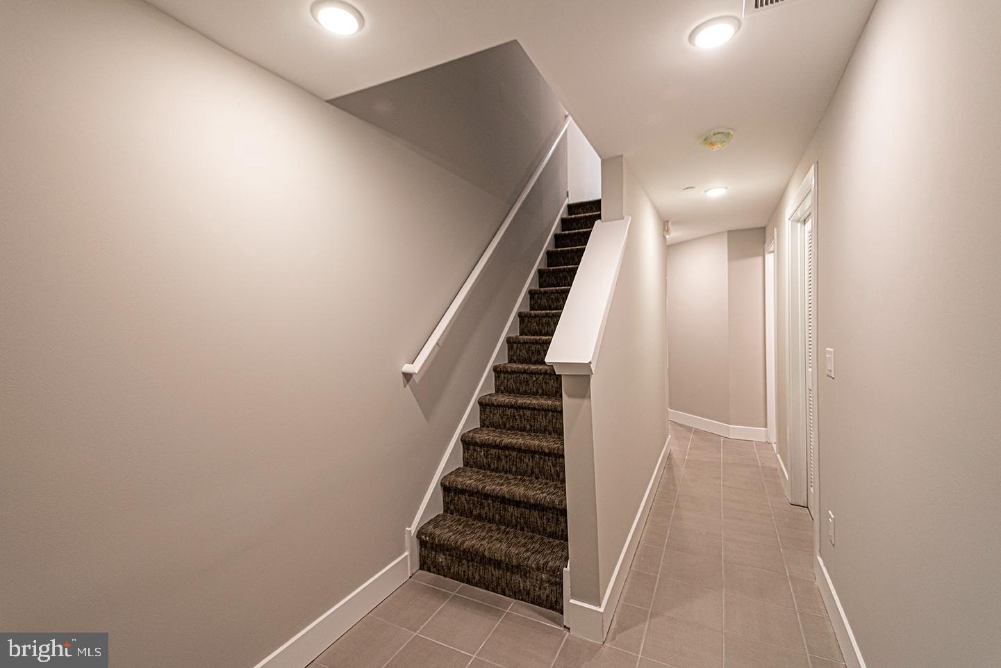 715 South 51st Street, Unit 1 Philadelphia, PA 19143 - Photo 10 of 18 a view of entryway and hall with wooden floor