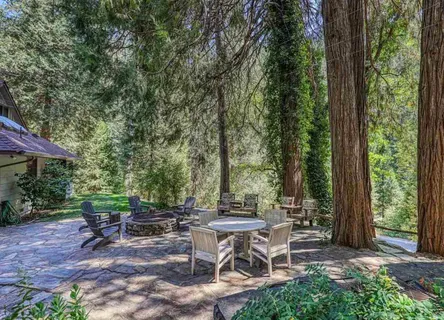 a view of a swimming pool with an outdoor space and seating area