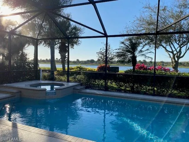 a view of a swimming pool with a patio