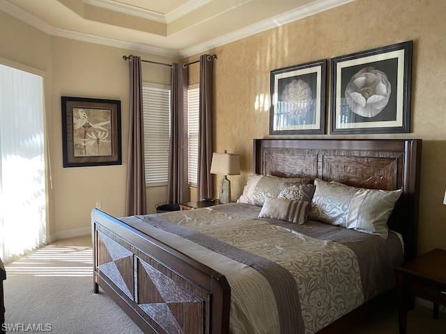 10307 Gator Bay Court Naples, FL 34120 - Photo 14 of 24 a bedroom with a bed and a painting on the wall