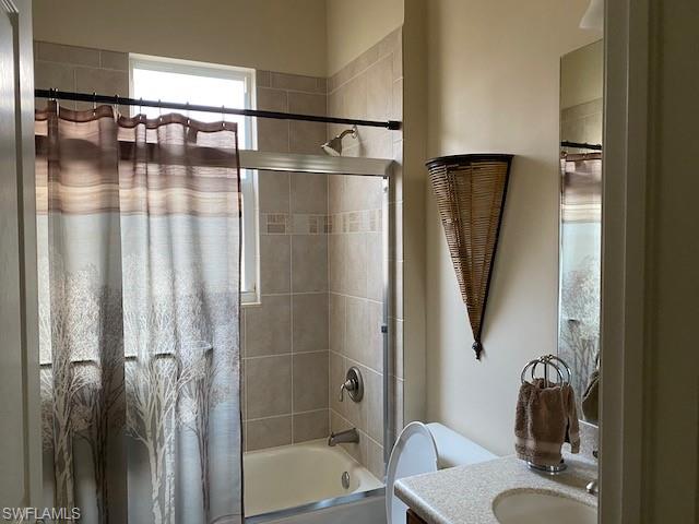 10307 Gator Bay Court Naples, FL 34120 - Photo 18 of 24 a bathroom with a shower and a mirror