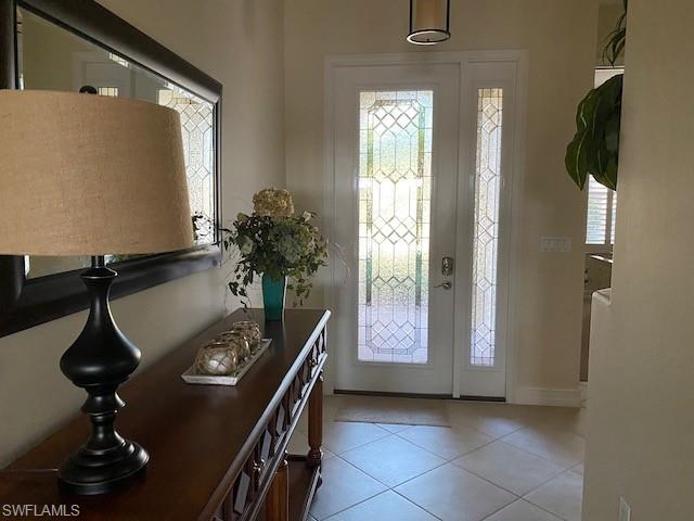 10307 Gator Bay Court Naples, FL 34120 - Photo 2 of 24 a view of a room with gym equipment