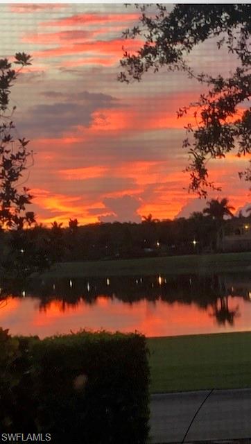 10307 Gator Bay Court Naples, FL 34120 - Photo 24 of 24 a view of mountain with sunset in background