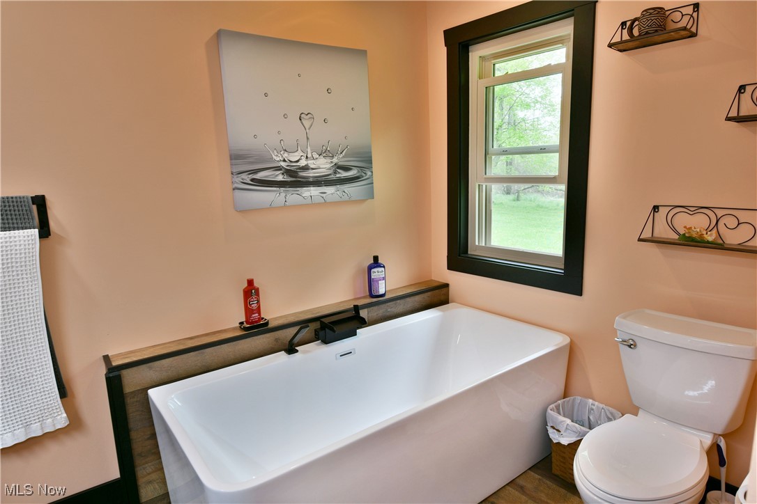 2907 Bushnell Campbell Road Fowler, OH 44418 - Photo 29 of 49 Full bath with toilet and a freestanding bath