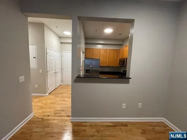 a view of a living room with a flat screen tv