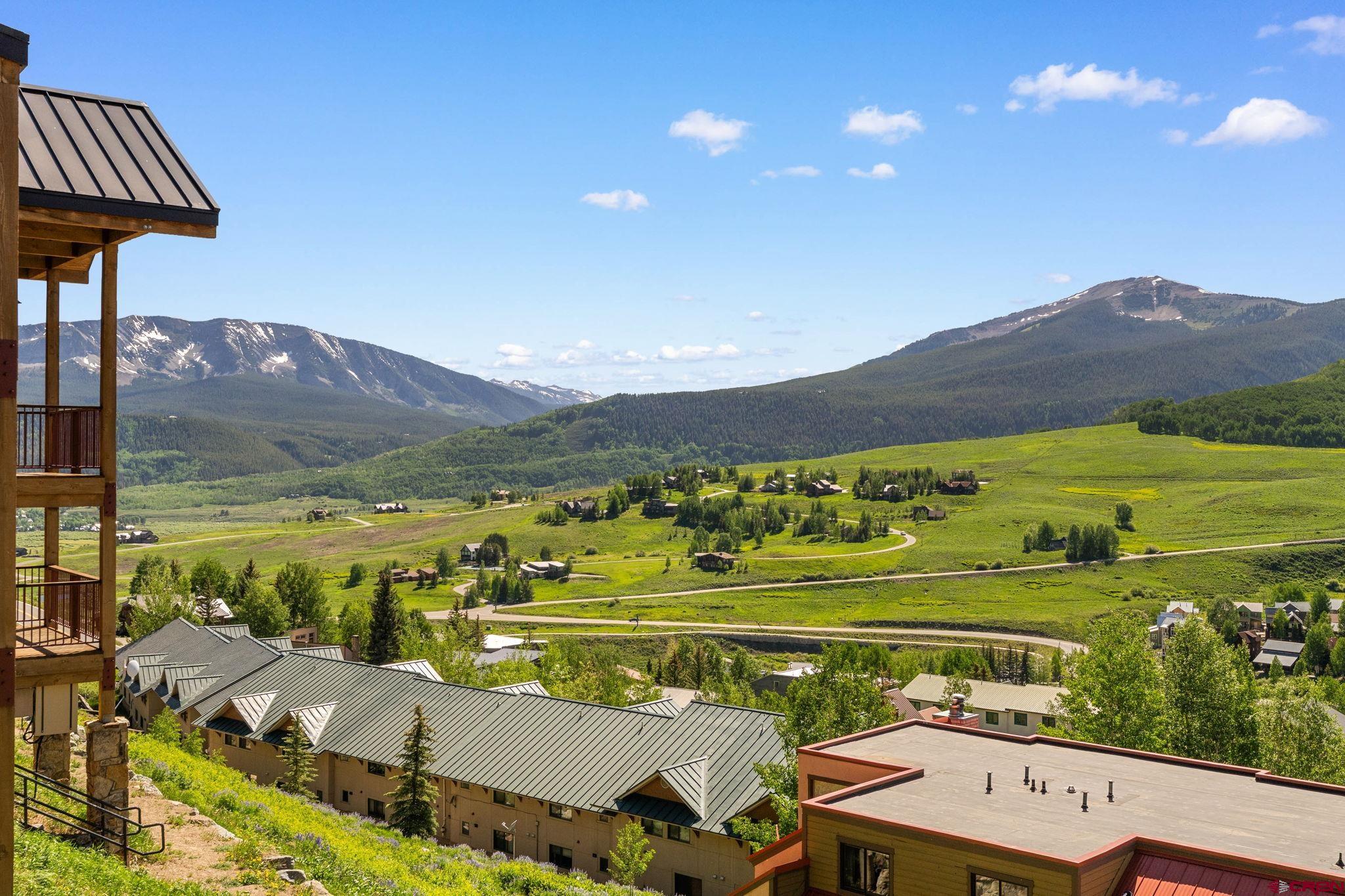 72 Hunter Hill Road, Unit I204 Crested Butte, CO 81225 - Photo 2 of 44 a view of a city from a terrace