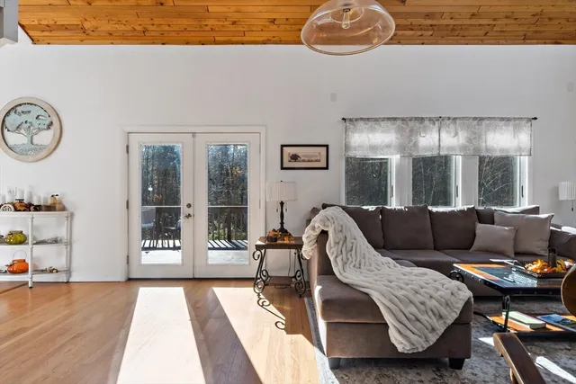 a living room with furniture and a table
