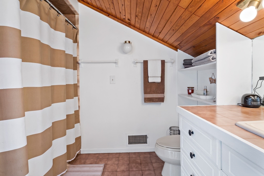 15 Carpenter Street Rehoboth, MA 02769 - Photo 36 of 42 a bathroom with a sink and a mirror