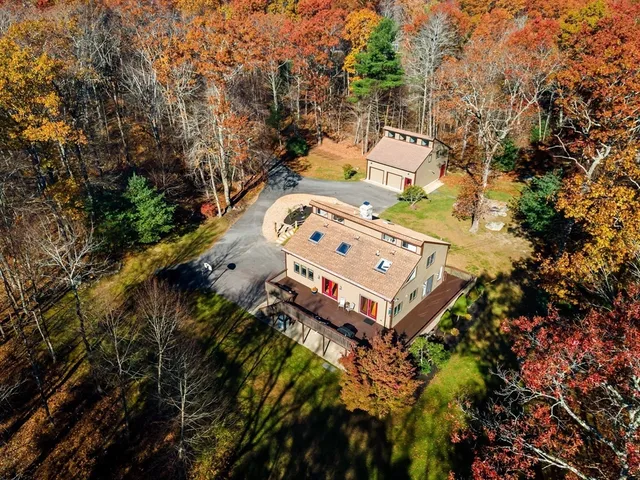 a view of a back yard of the house