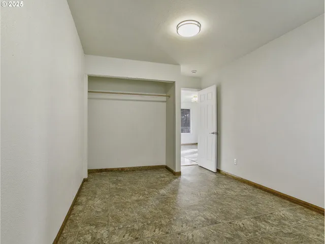 an empty room with closet