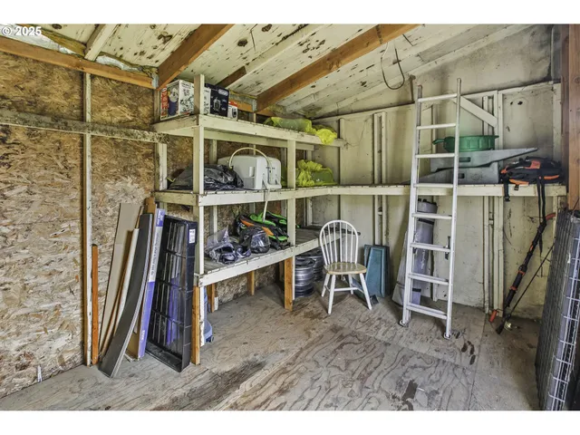 a view of a chairs and table in a patio