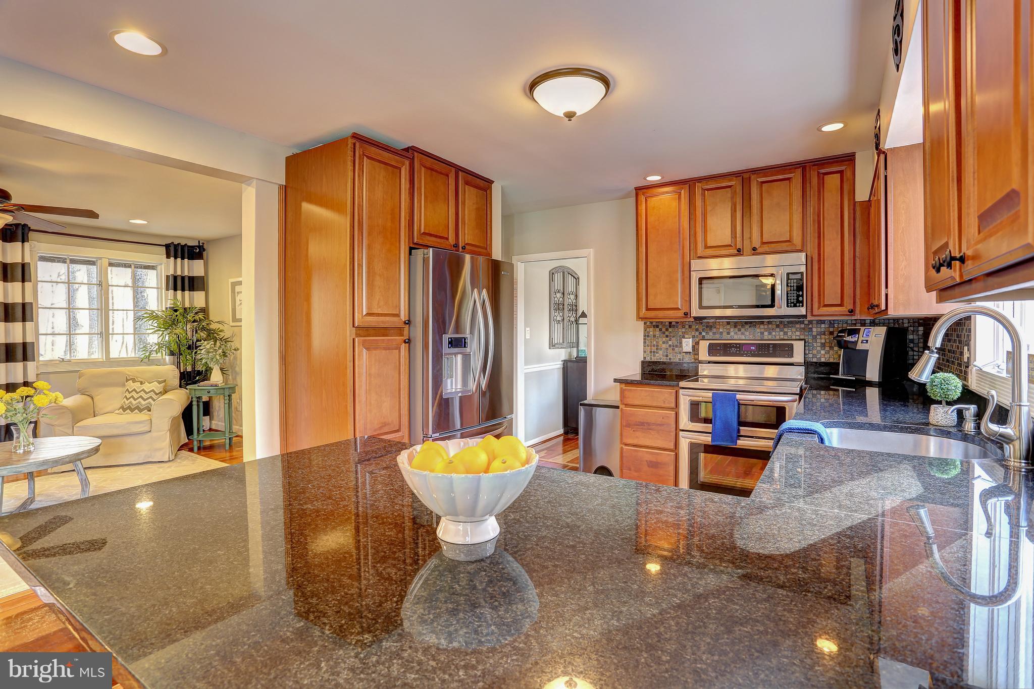 12233 Etchison Road Ellicott City, MD 21042 - Photo 9 of 48 VIEW FROM BREAKFAST BAR TOWARDS LIVING ROOM