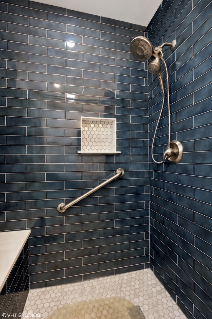6321 North Merrimac Avenue Chicago, IL 60646 - Photo 11 of 21 a bathroom with a shower