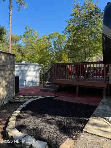 a view of swimming pool with a yard