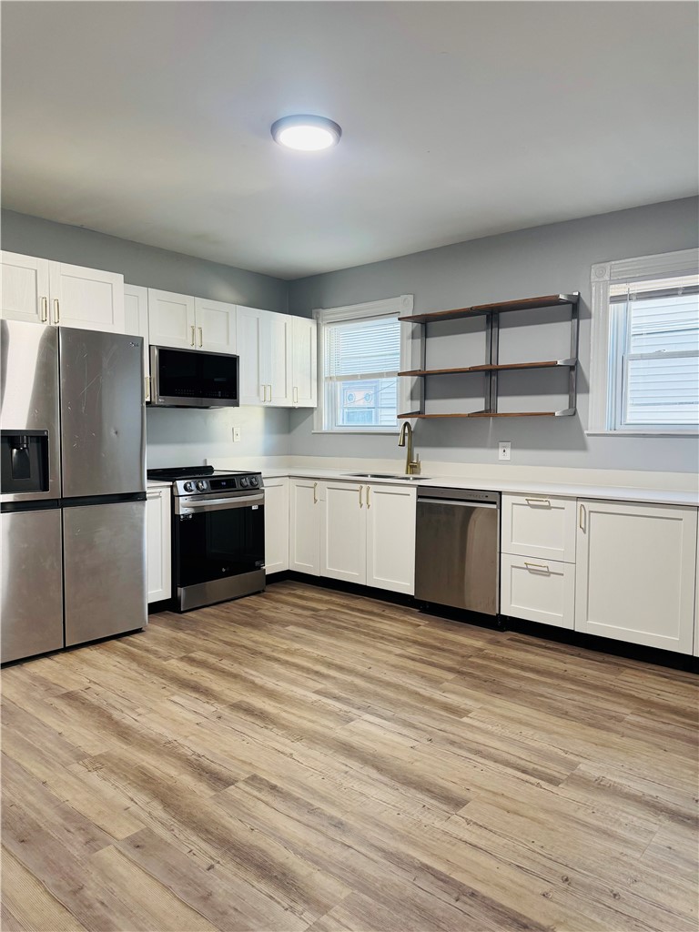 65 Raymond Street, Unit 1 Providence, RI 02908 - Photo 1 of 15
