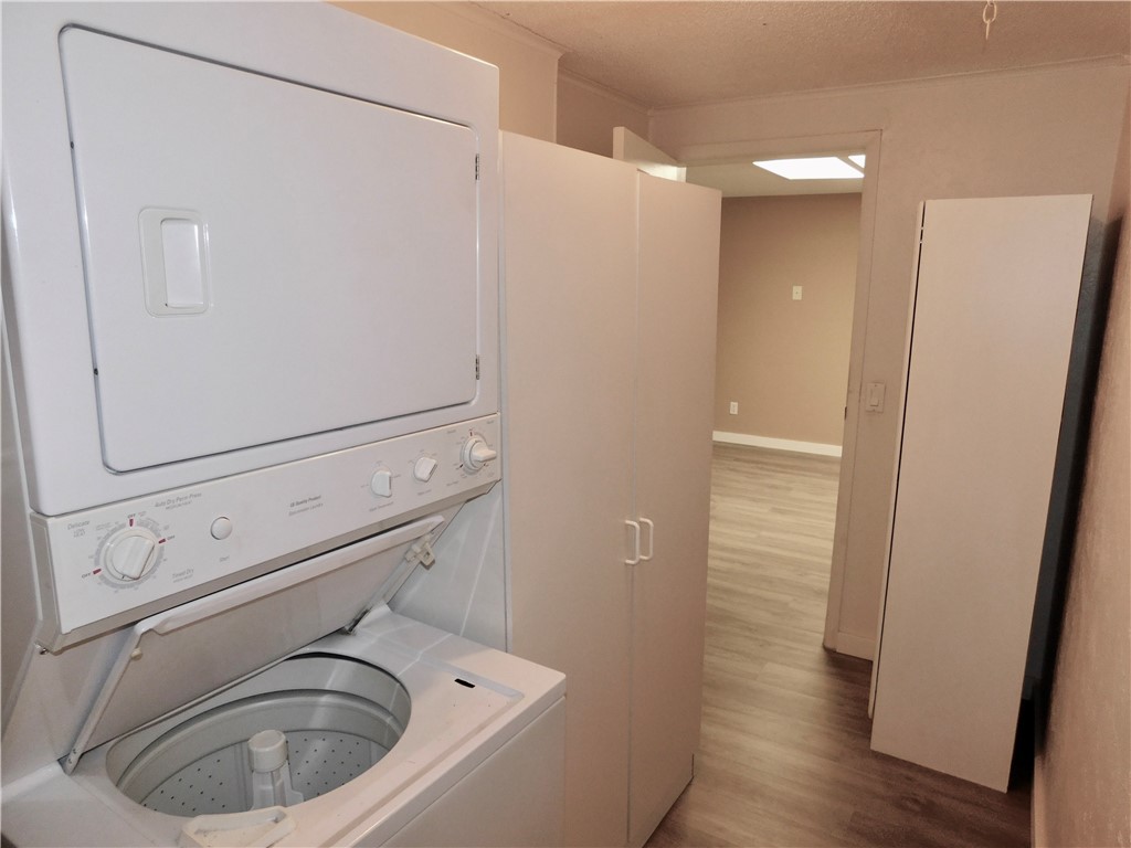 532 7th Place, Unit 532 Vero Beach, FL 32962 - Photo 5 of 8 a utility room with dryer and washer