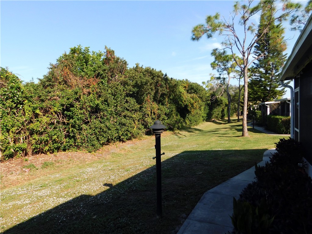 532 7th Place, Unit 532 Vero Beach, FL 32962 - Photo 8 of 8 a view of yard with green space