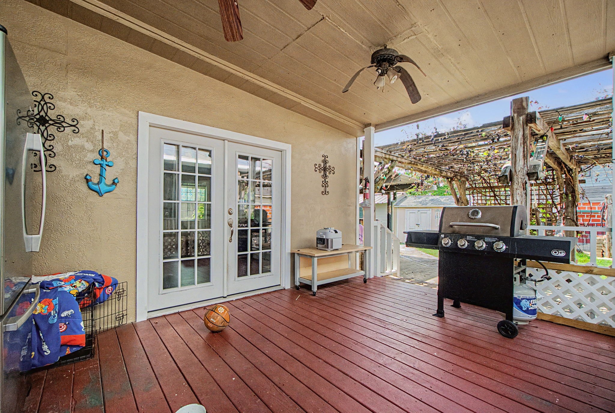 10034 Alfred Lane Houston, TX 77041 - Photo 47 of 50 Fire up the grill and host unforgettable gatherings on this covered outdoor living space.