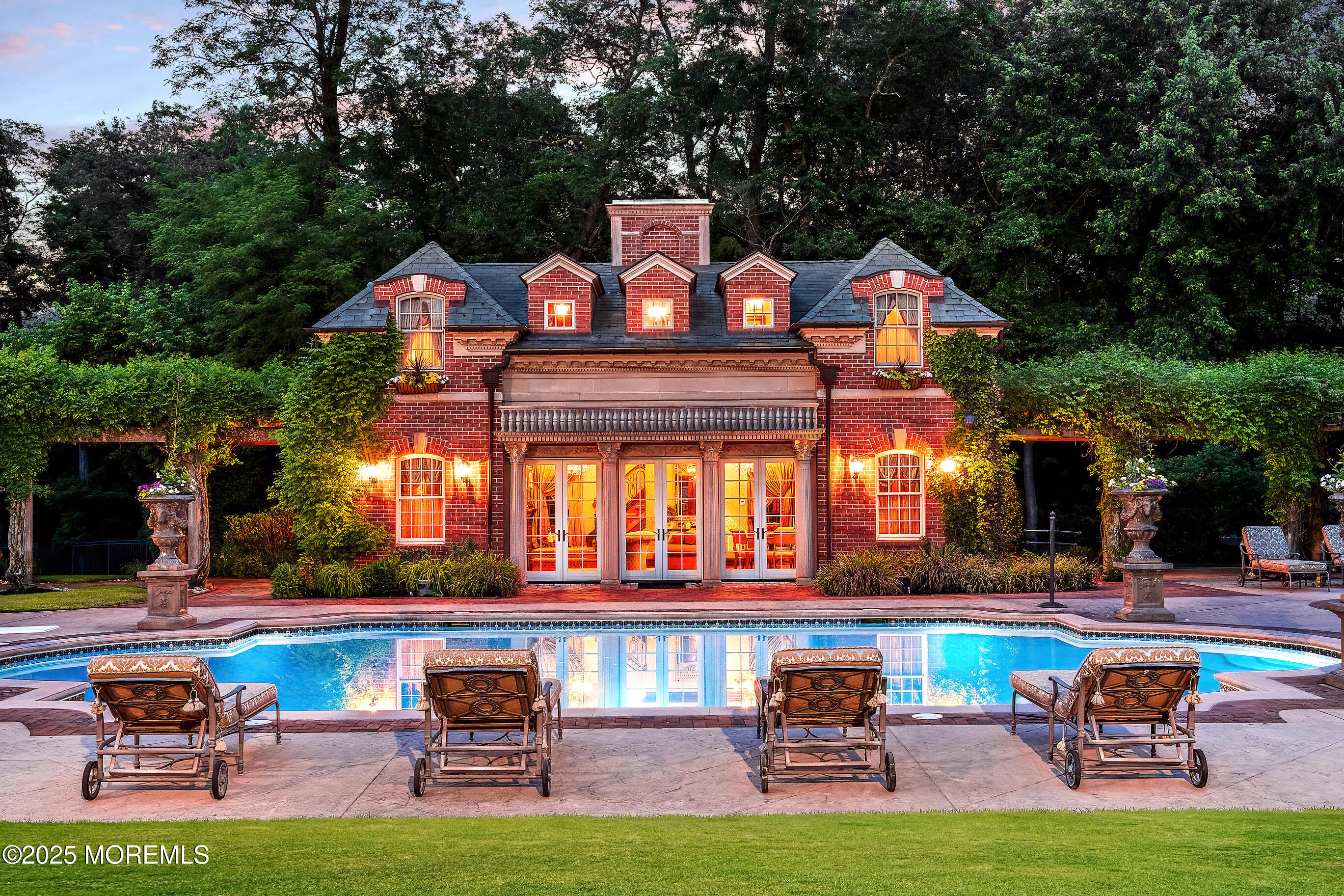 152 Bucks Mill Road Colts Neck, NJ 07722 - Photo 12 of 16 a view of pool with lawn chairs and large trees