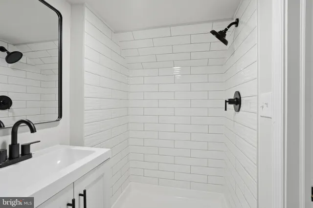 a view of a balcony with a white house