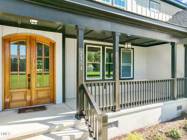 a view of a balcony with door