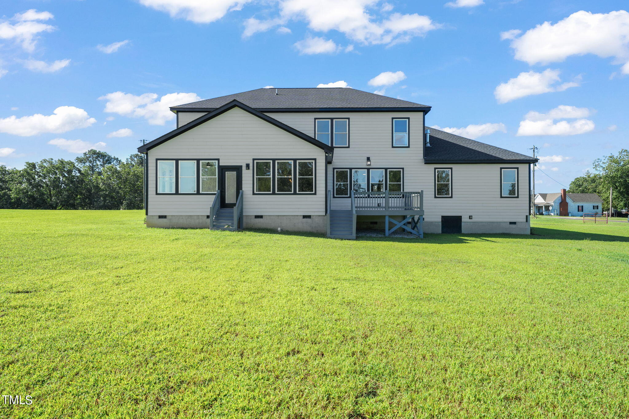 2804 Jack Mitchell Road Zebulon, NC 27597 - Photo 50 of 56 a front view of a house with a yard