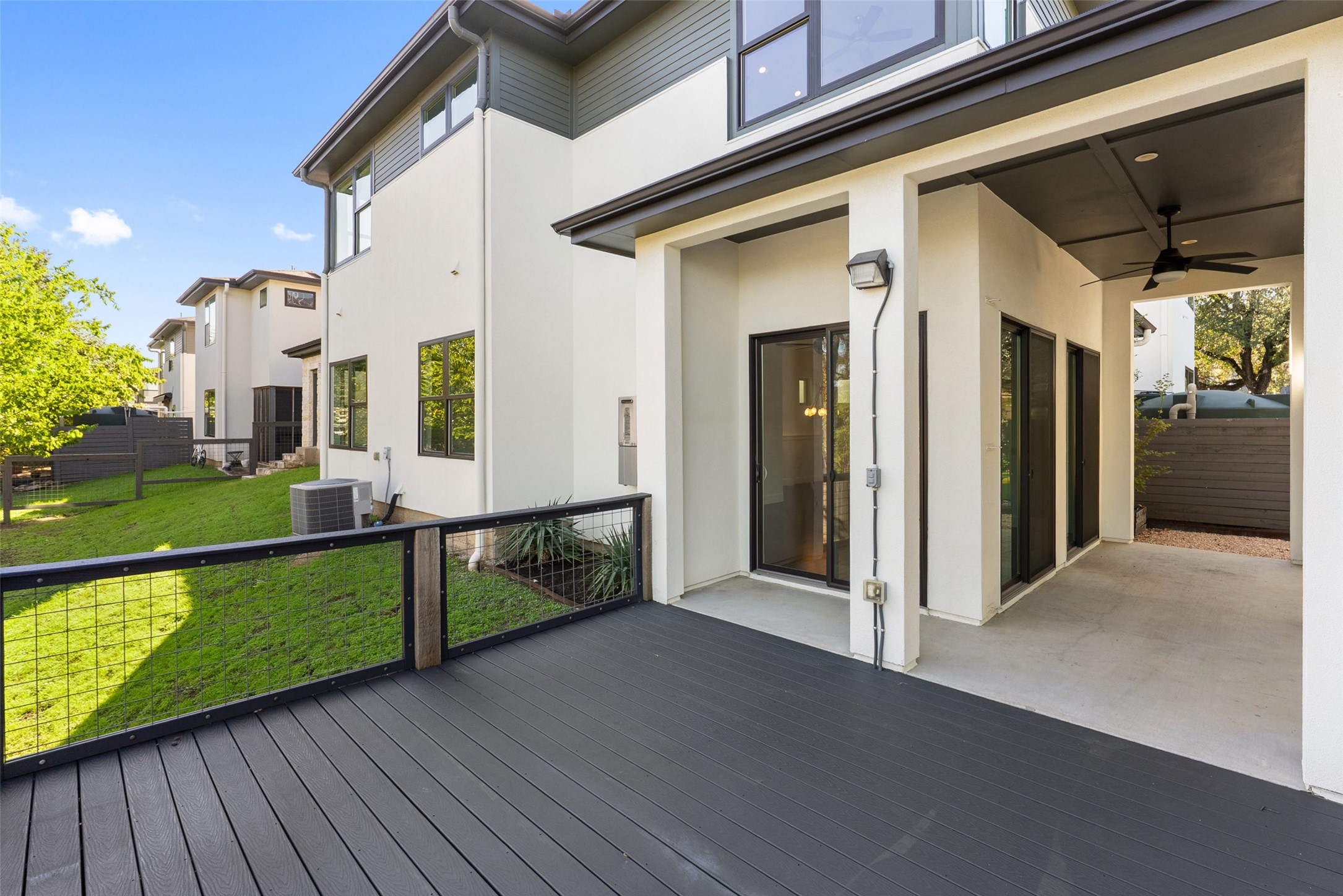 1303 Azie Morton Road, Unit 6 Austin, TX 78704 - Photo 11 of 40 a view of a house with a wooden deck