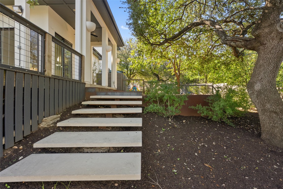 1303 Azie Morton Road, Unit 6 Austin, TX 78704 - Photo 15 of 40 a view of a pathway of a house with large trees