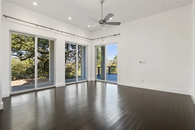 a view of an entryway with wooden floor