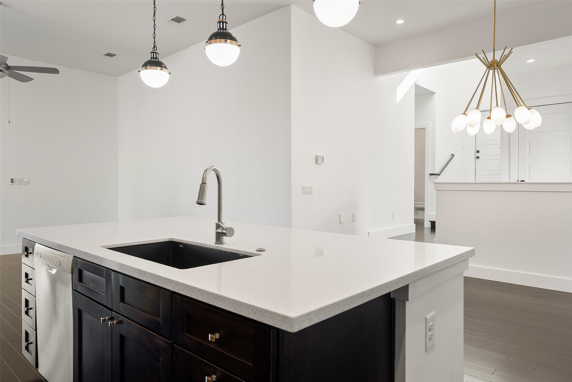 1303 Azie Morton Road, Unit 6 Austin, TX 78704 - Photo 20 of 40 a kitchen with a sink a counter and a stove