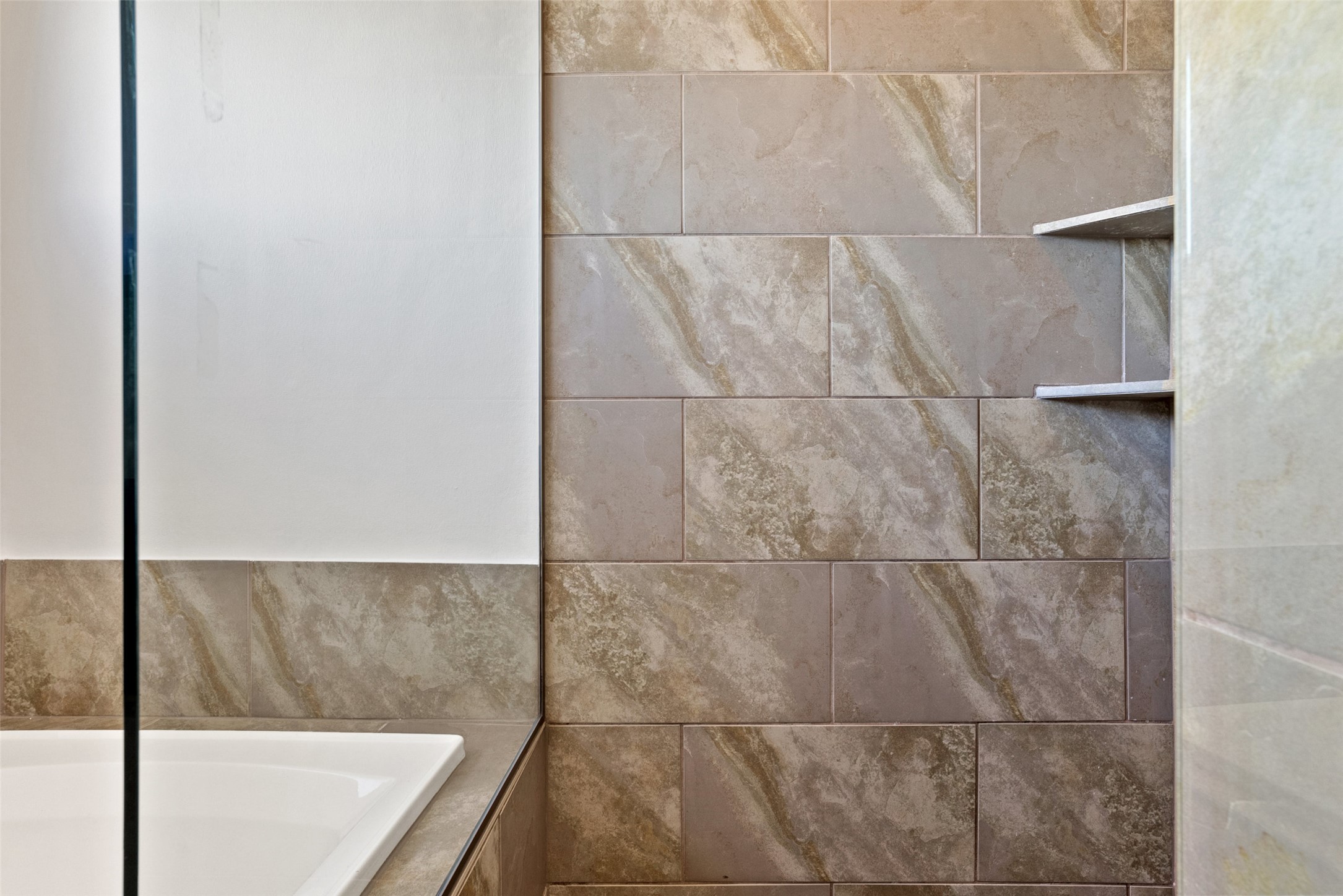 1303 Azie Morton Road, Unit 6 Austin, TX 78704 - Photo 37 of 40 a bathroom with a bathtub