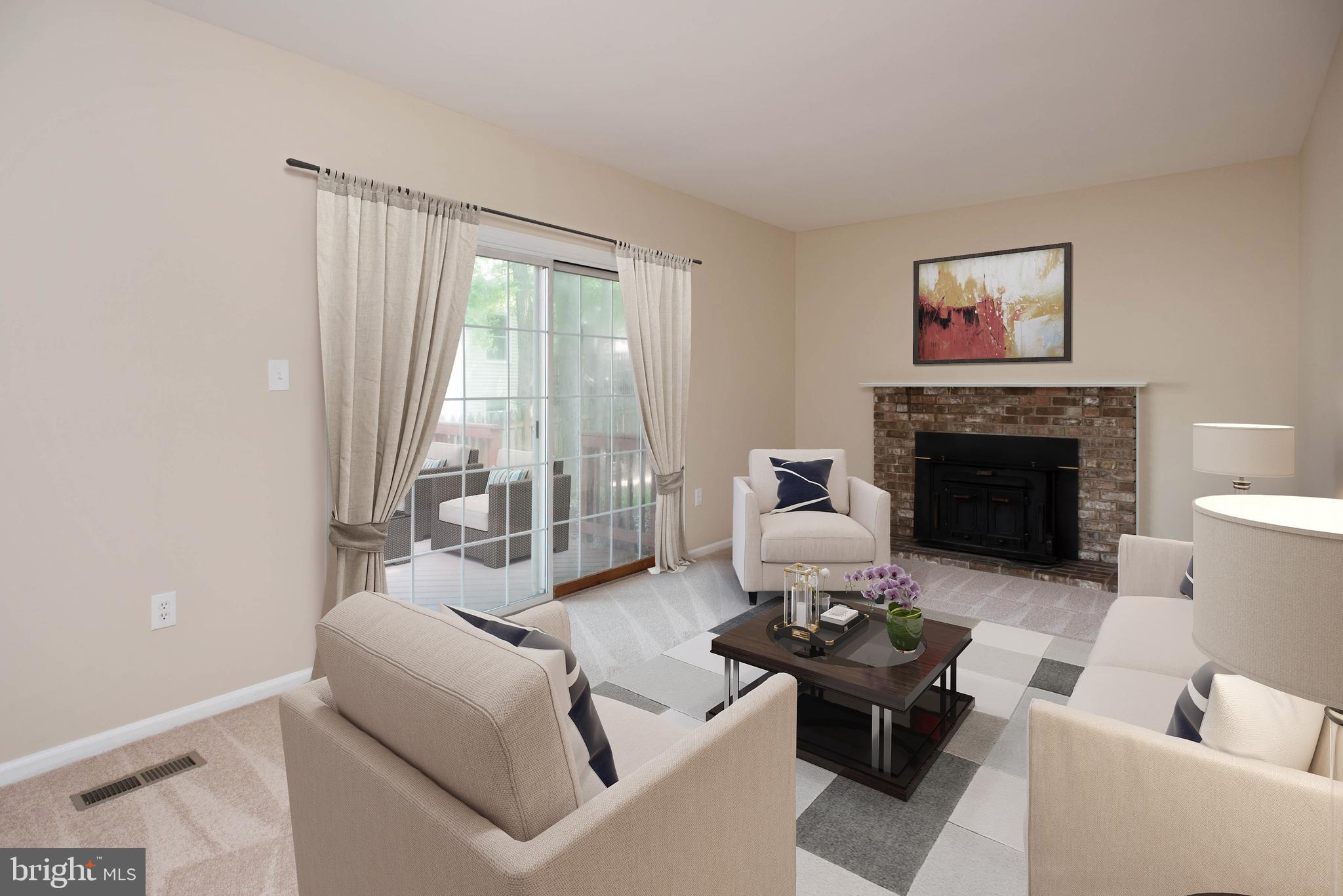 8902 Spur Road Springfield, VA 22153 - Photo 10 of 34 Family Room with Fireplace and deck access
