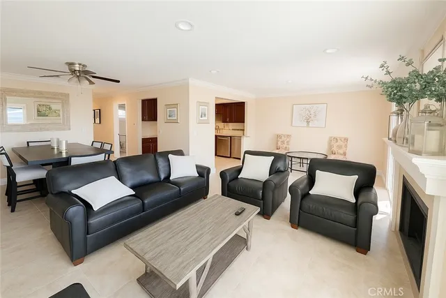 a living room with furniture rug and window