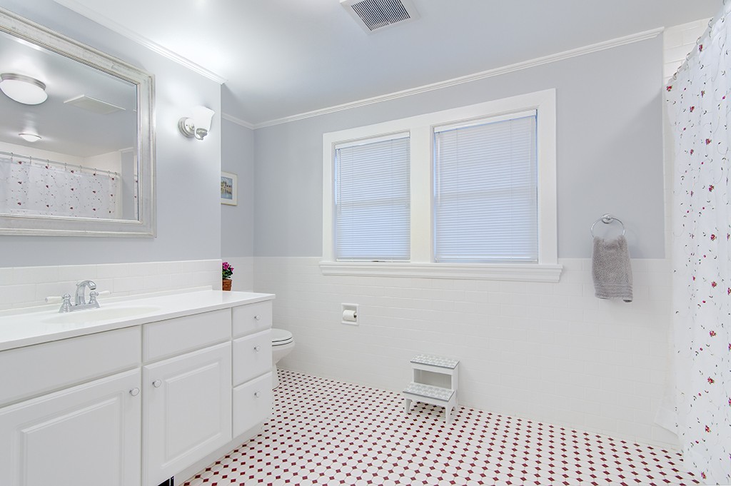 61 Silver Hill Road Weston, MA 02493 - Photo 14 of 18 a bathroom with a sink a toilet and a mirror