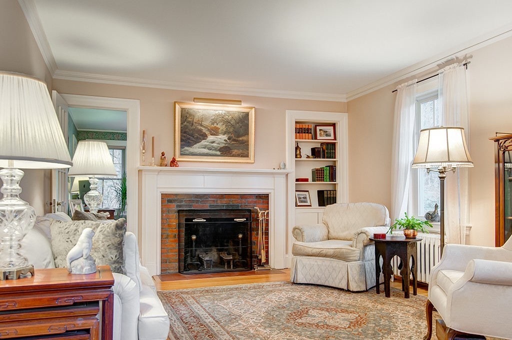 61 Silver Hill Road Weston, MA 02493 - Photo 3 of 18 a living room with furniture and a fireplace
