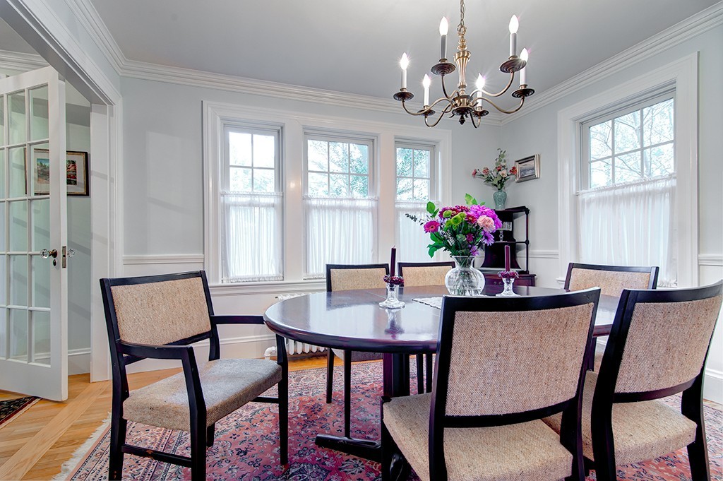 61 Silver Hill Road Weston, MA 02493 - Photo 4 of 18 a view of a dining room with furniture window and wooden floor