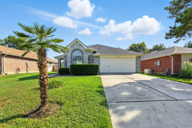 a house view with a garden space