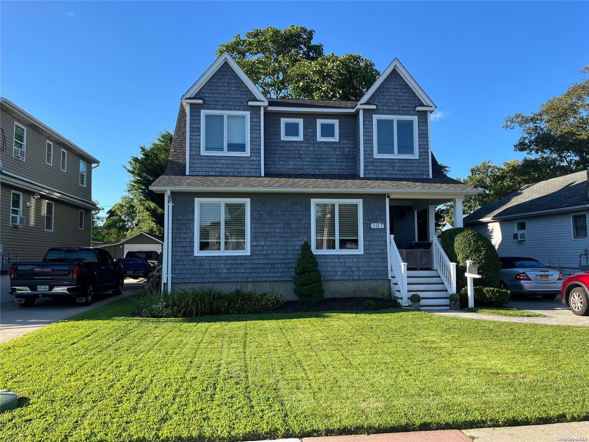107 Laurel Street Patchogue, NY 11772 - Photo 1 of 1 Front