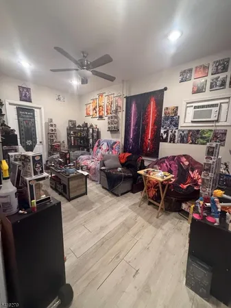 a bathroom with a sink mirror and toilet